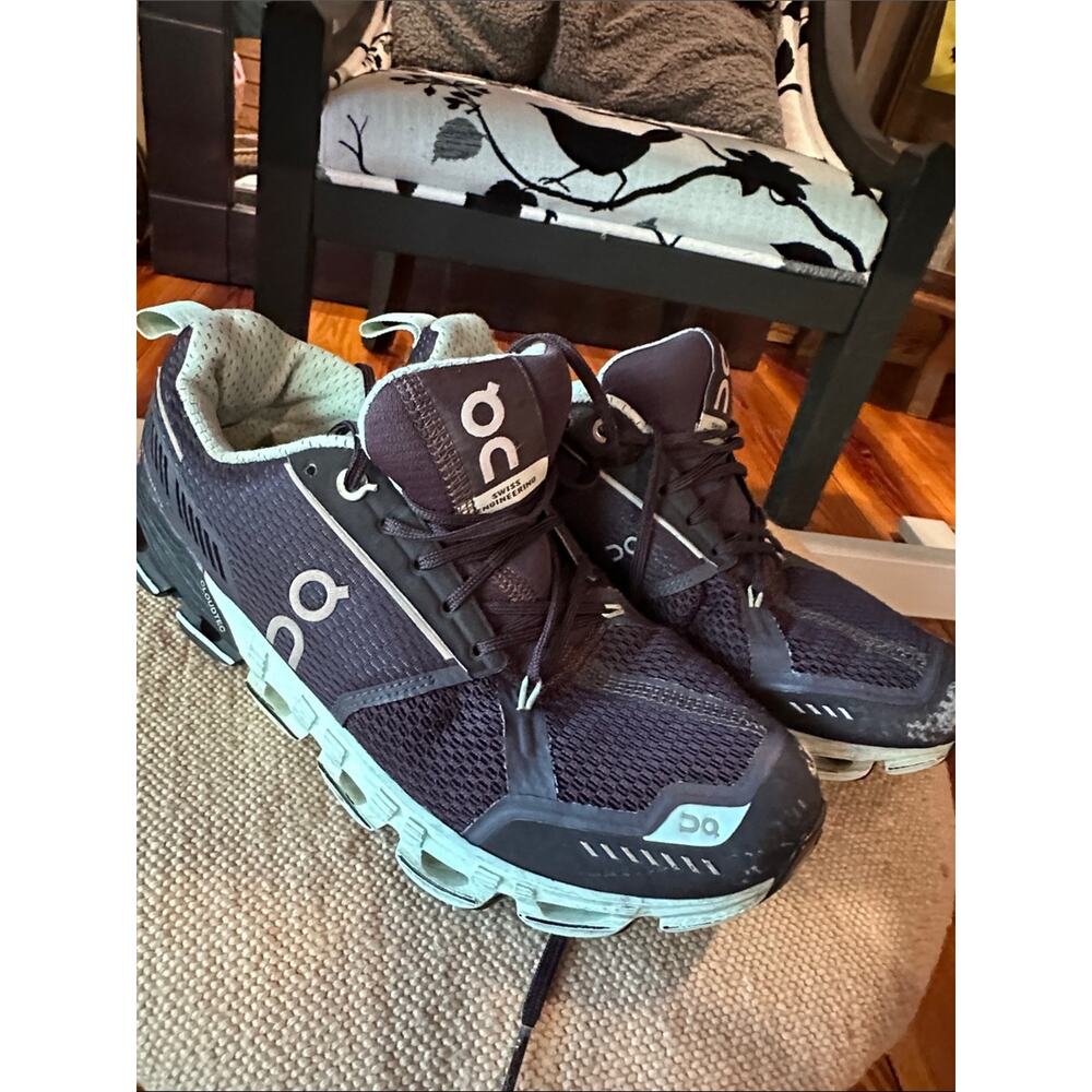 On Cloudrunning Women's Athletic Shoes in Black with Light Blue Accents